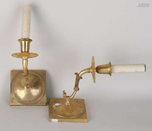 Two gold-plated brass Empire-style wall lamps. Circa