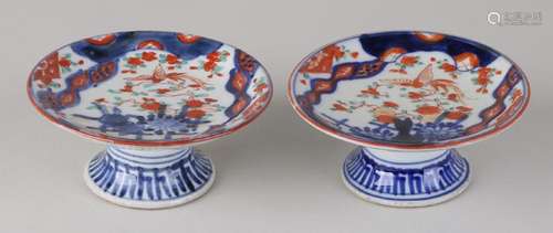 Two Japanese Imari porcelain dishes on high feet.