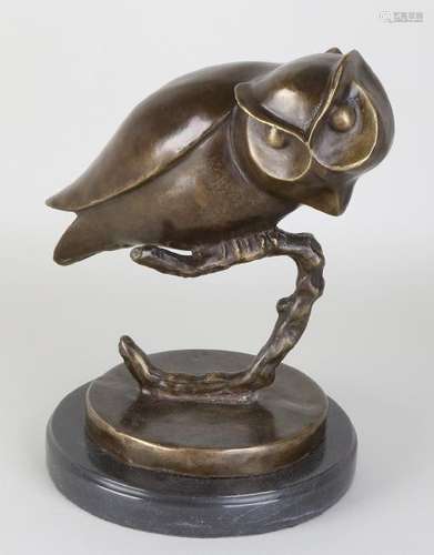 Bronze owl on branch with black marble base. With