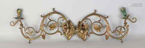 Two gold-plated brass Neo Gothic wall sconces with