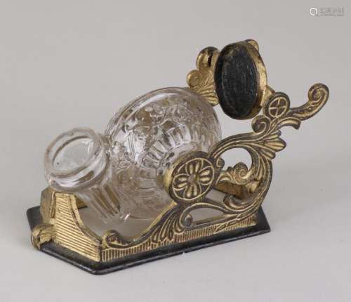 Brass ink set with tilting glass inkwell with floral
