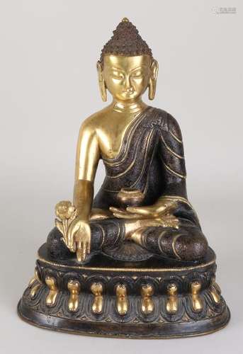 Old / antique gilt Chinese Buddha in lotus position.