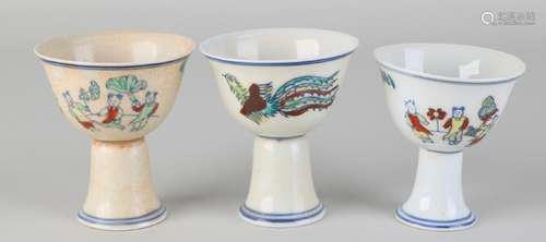 Three old Chinese porcelain voting cups with Chinese