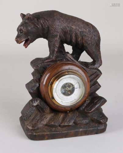 Antique German walnut Schwarzwald barometer with bear.