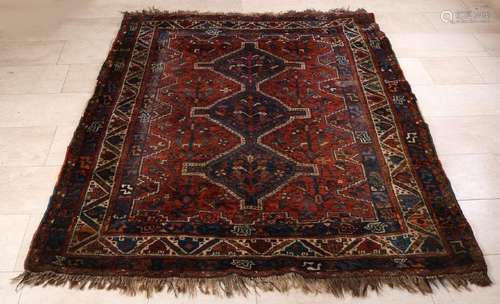 Hand-knotted Persian carpet, Iran. Red / blue in color.