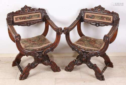 Two 19th century walnut scissor chairs with petit point