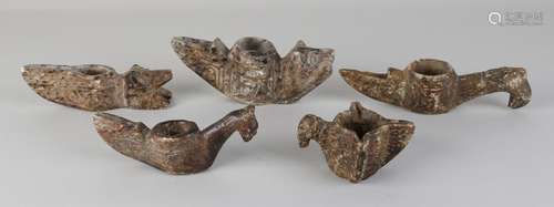 Five times old South American soapstone oil lamps.