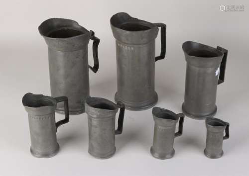 Seven antique pewter sizes. Stamped. 19th century.
