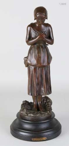 Antique French statue. Grieving woman. Circa 1900.