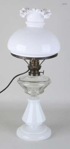 Antique milk glass electrified petroleum lamp. Circa