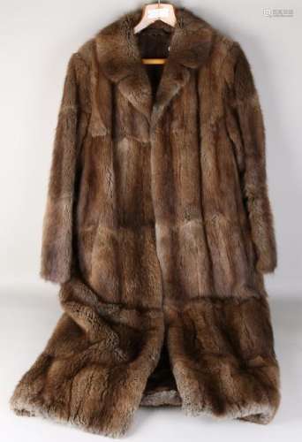 Long women's winter fur coat. Dimensions: 135 cm. In