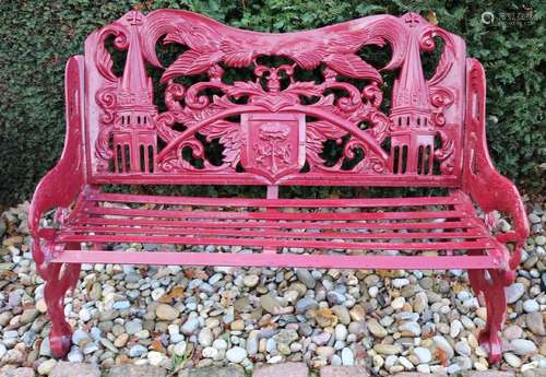 Old cast iron red castle garden bench with family