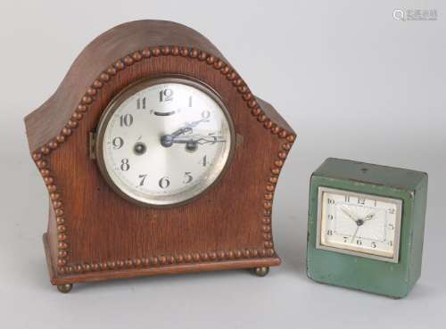Two old / antique clocks. One time oak table clock with