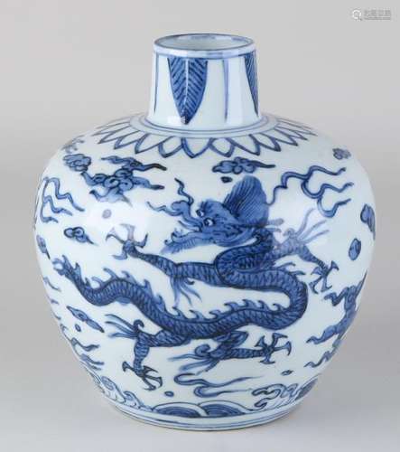 Ancient Chinese porcelain ball vase with dragon decor.