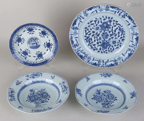 Four Chinese porcelain plates with blue decor. Two