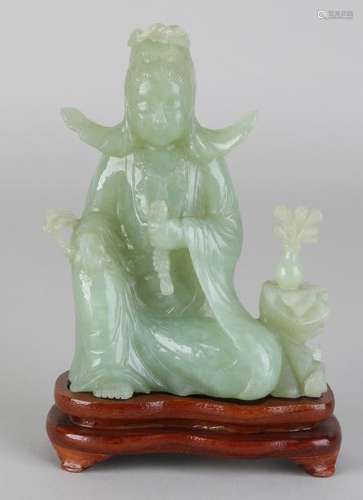 Ancient Chinese jade carved figure on wooden base. Quan