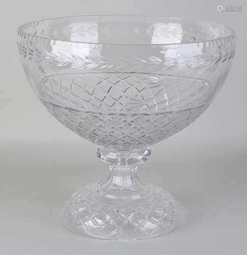 Very large crystal glass fruit bowl with floral decor.