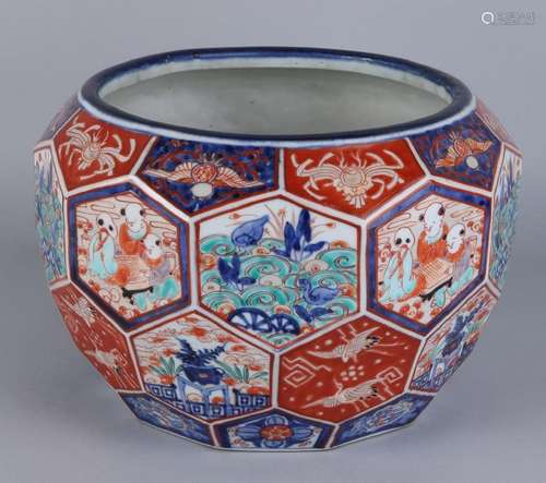 Large antique Imari porcelain flowerpot with various