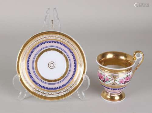 19th century gilt Biedermeier cup and saucer with