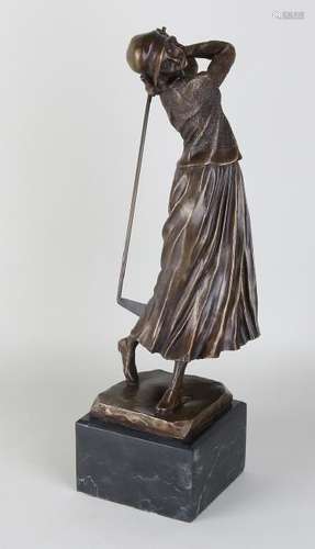 Bronze golfer on black marble base. E. Valdez. 21st