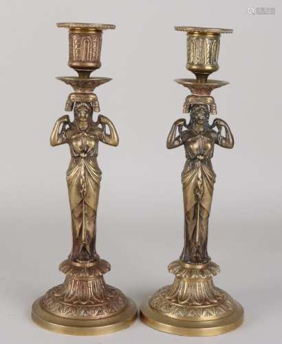 Two 19th century bronze Empire-style candle holders
