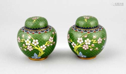 Two Japanese cloisonne ginger jars with floral decor.