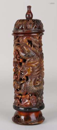 Ancient Chinese carved lid holder with dragon decor.