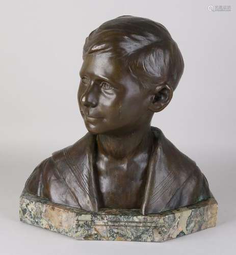 Antique bronze boy's bust on marble base. Marc Paul