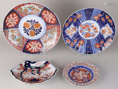 Four 19th century Imari porcelain plates. Consisting