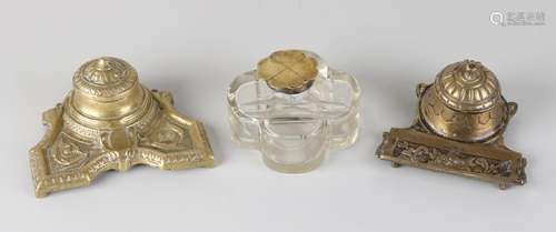 Three antique inkwells with brass and inner trays.