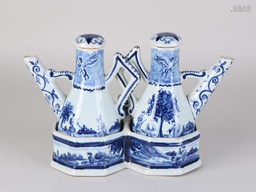 Dutch Delft Fayence oil and vinegar set. Signature De