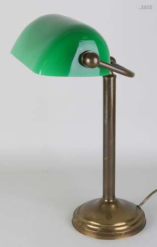 Old brass retro desk lamp with green glass shade.