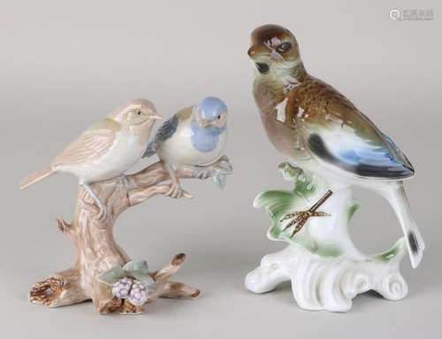 Two old porcelain bird figures. 20th century. One time