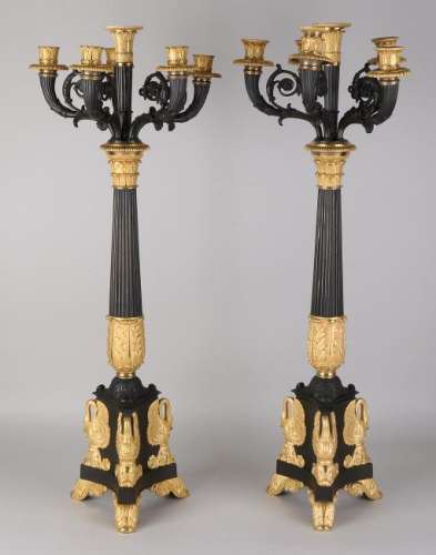 Two capital large fire-gilt Empire candle holders with