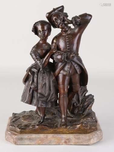 Antique bronze figure on marble base. Around 1880.