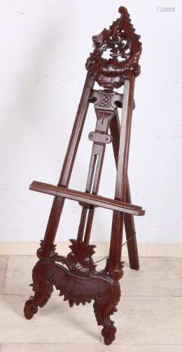 Old mahogany easel in Rococo style. Second half of the