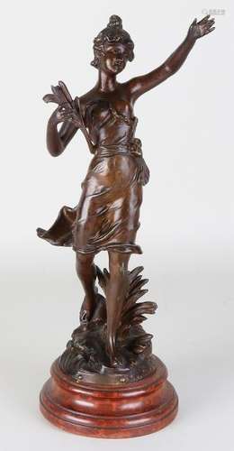 Antique French statue. Prime Minister Nio, woman on a