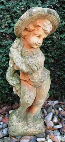 Old concrete cast garden image. 20th century. Young man
