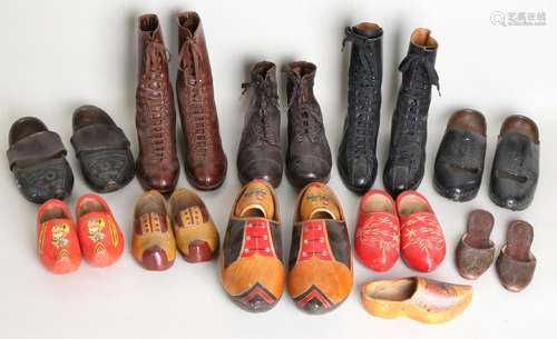 Lot of antique leather shoes and painted clogs. In box.