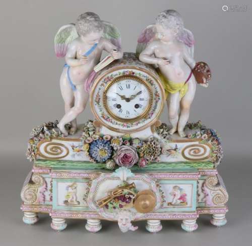 Antique French porcelain pendulum with putti and