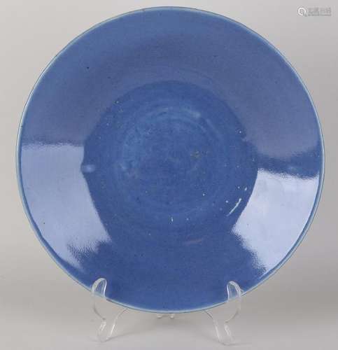 Old / antique Chinese porcelain dish with blue glaze.