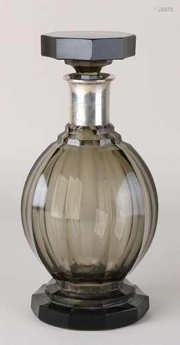 Art Deco crystal glass carafe with a low silver neck.