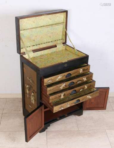 Japanese lacquerware cabinet with gold decor and