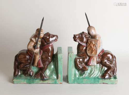 Two large ceramic glazed bookends. Knights on horseback