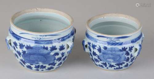 Two old Chinese porcelain pots with floral decor. One