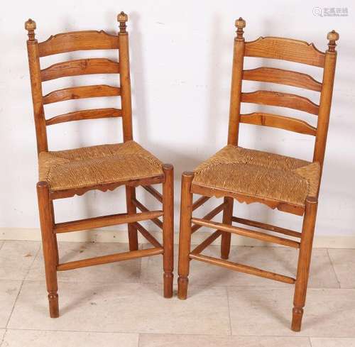 Six antique Dutch elm chairs with rush seats.