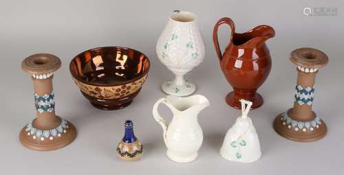 Eight parts of various antique pottery. England. Among