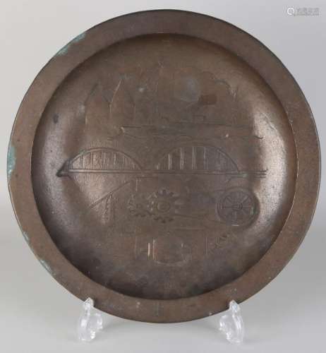 Old copper-walled wall plate with monogram KG. Circa