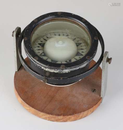 Old iron ship's compass in suspension. Circa 1930 -