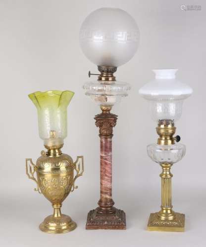 Three antique standing paraffin lamps. Two with crystal